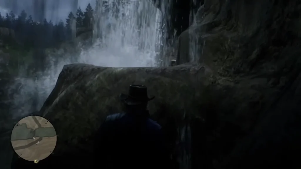 RDR2 A fallen log leading to a hidden cave behind Cumberland Falls the high stakes treasure 1